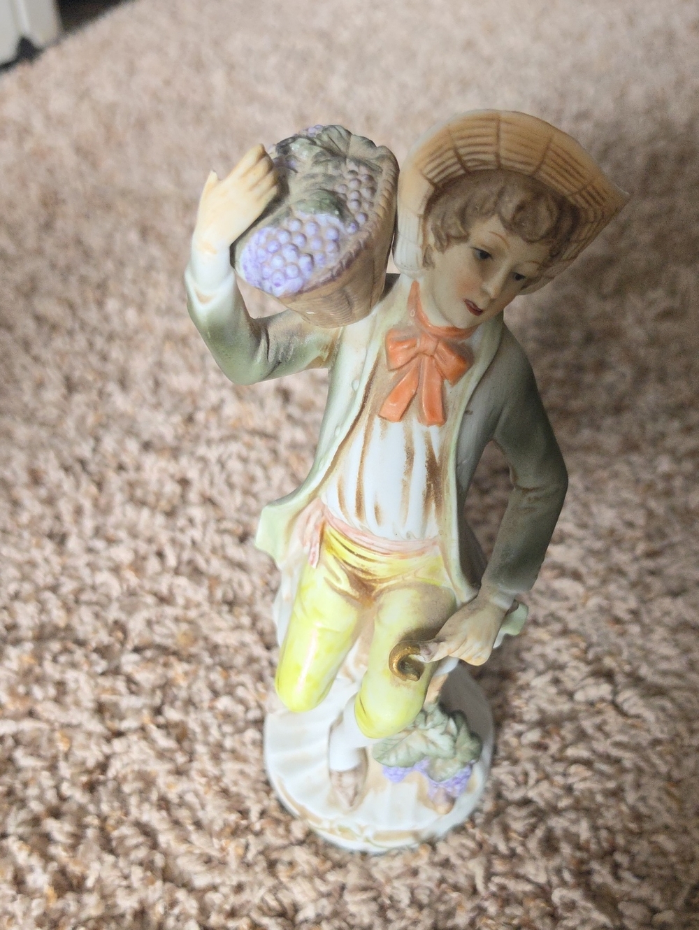 Porcelain Figurine of Boy with Fruit Basket - Green, Yellow, Purple